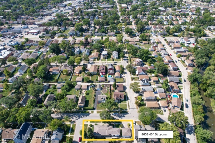 8636 40th Street Lyons, IL 60534 - Photo 50 of 50 an aerial view of residential houses with city view