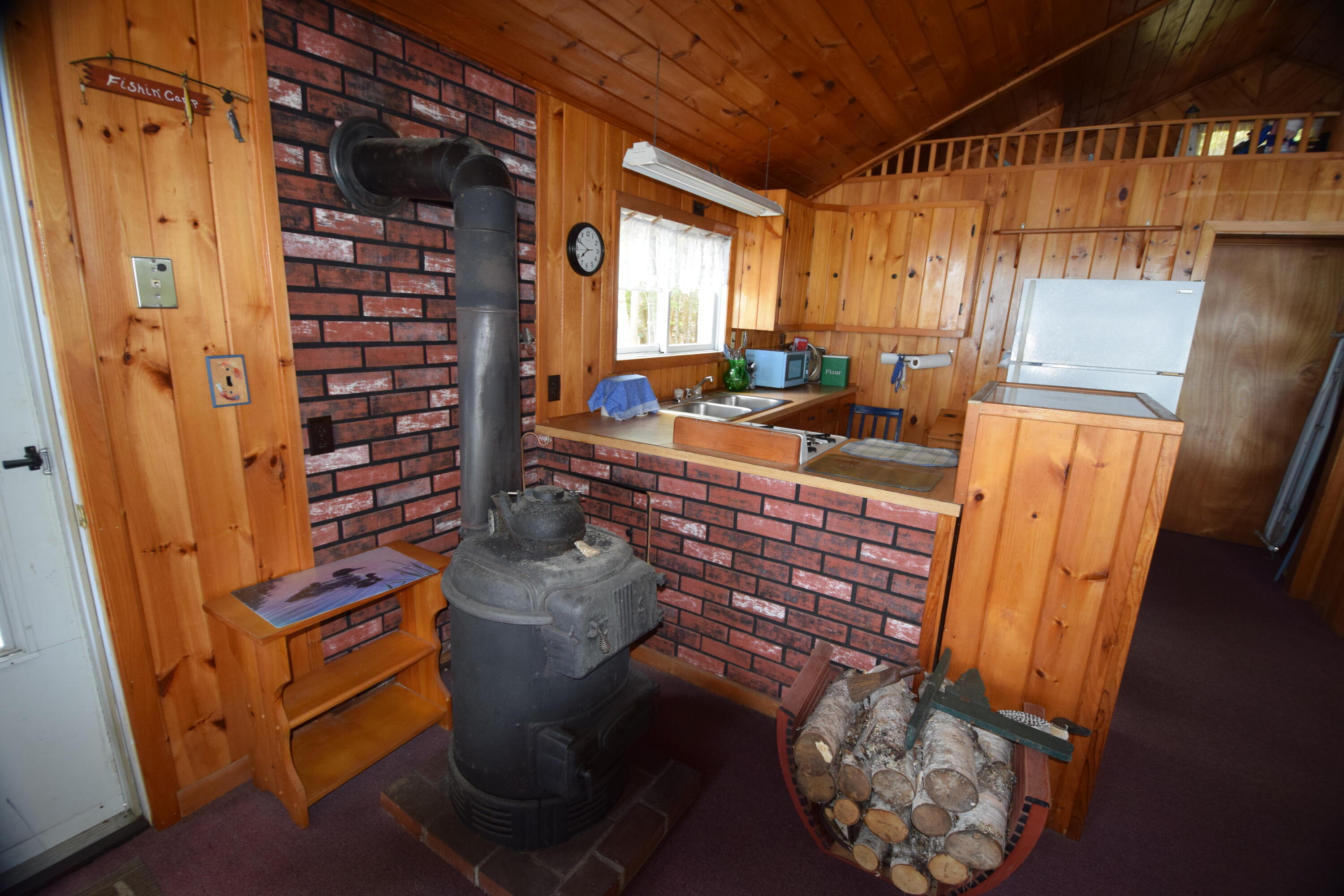 0 Sand Bar Road Princeton, ME 04668 - Photo 33 of 44 Woodstove & kitchen area...