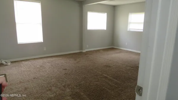 an empty room with a window