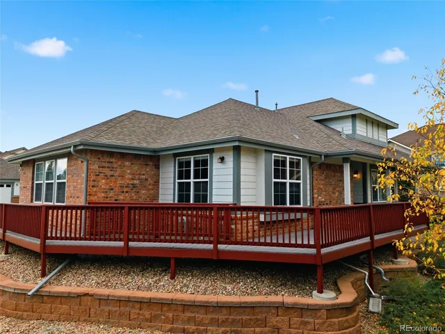 a view of a house with a roof deck