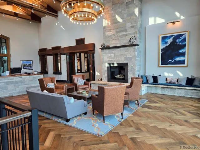 a dining room with a table and chairs