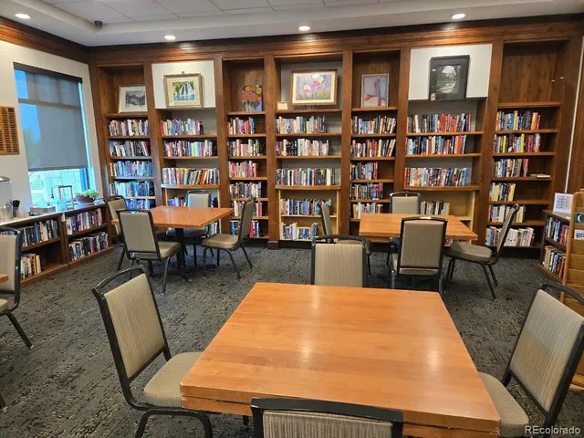 an aerial view of a house with a lake view