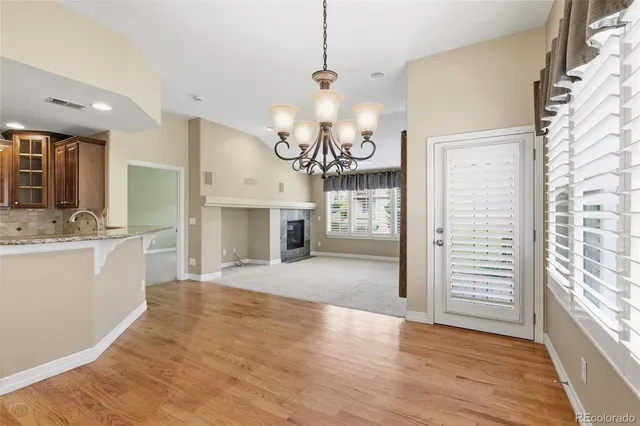 a view of livingroom with window and hardwood floor