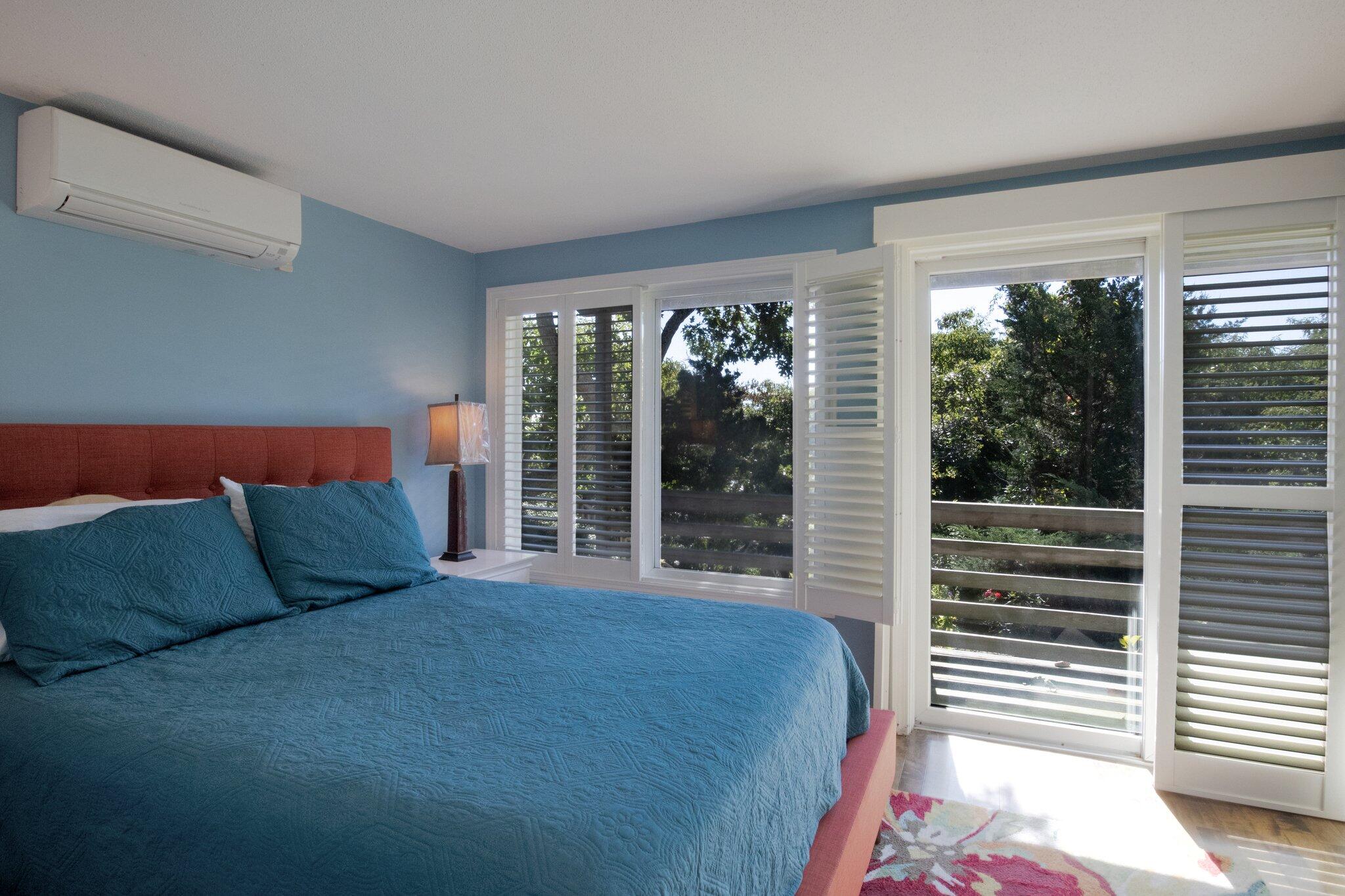 4 Willow Drive, Unit 9 Provincetown, MA 02657 - Photo 19 of 25 a bed sitting in a bedroom next to a window