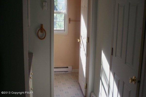 149 423rd Route Pocono Pines, PA 18350 - Photo 5 of 6 a view of a hallway with windows