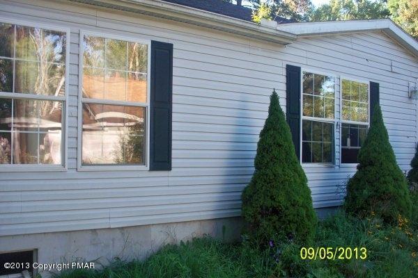 149 423rd Route Pocono Pines, PA 18350 - Photo 6 of 6 a view of a house with a yard