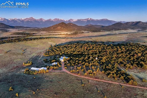 a view of lake with mountain in the background