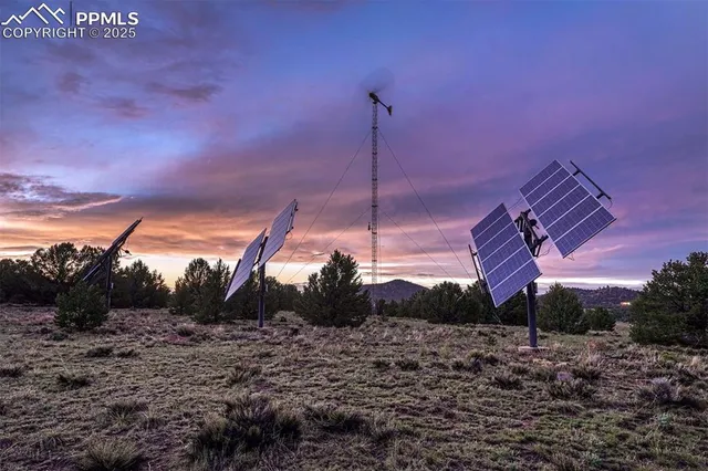 a view of a house with a yard and a large pool