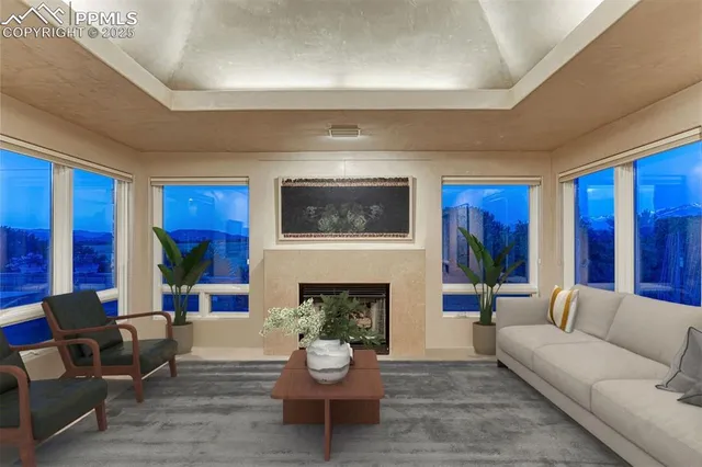 a view of a dining room with furniture window and outside view