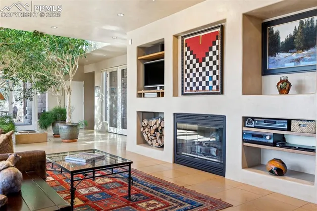 a swimming pool with outdoor seating