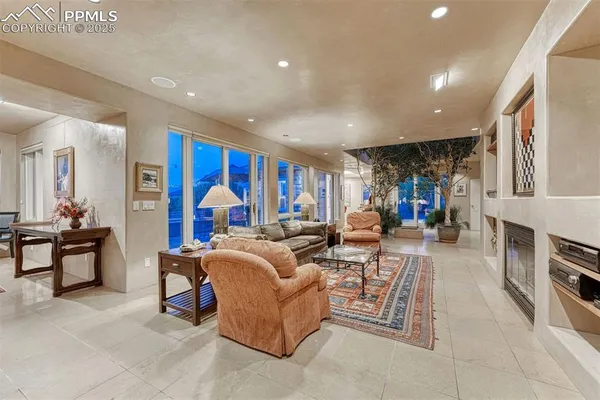 a kitchen with granite countertop wooden cabinets and stainless steel appliances