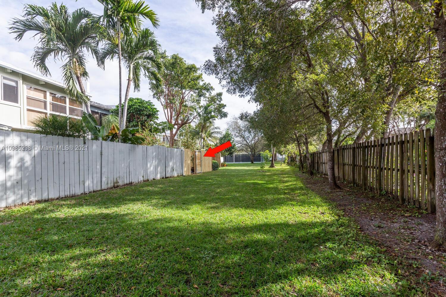 7028 Southwest 53rd Lane Miami, FL 33155 - Photo 19 of 27 a garden with palm trees