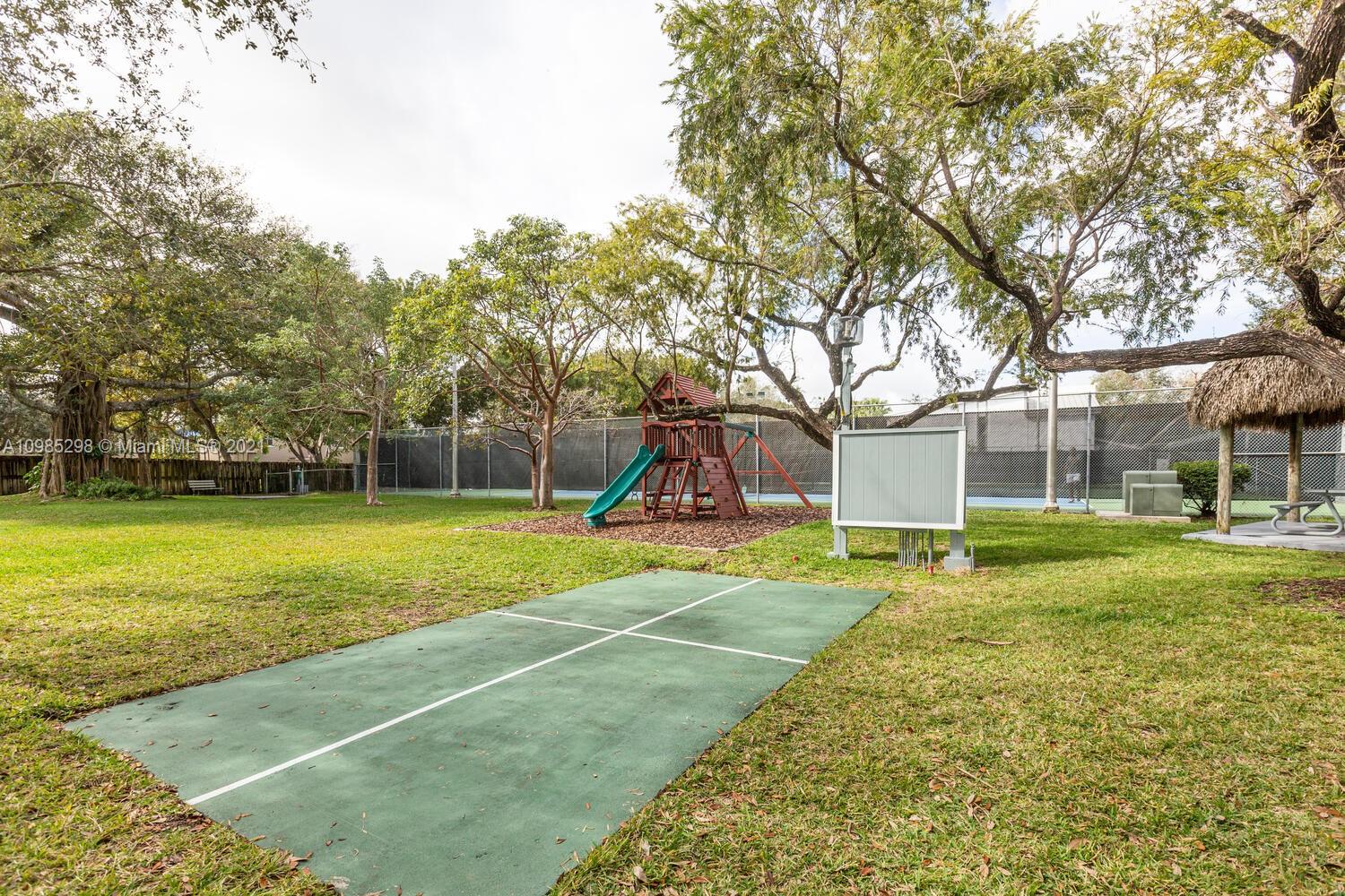 7028 Southwest 53rd Lane Miami, FL 33155 - Photo 20 of 27 a view of a volley ball court