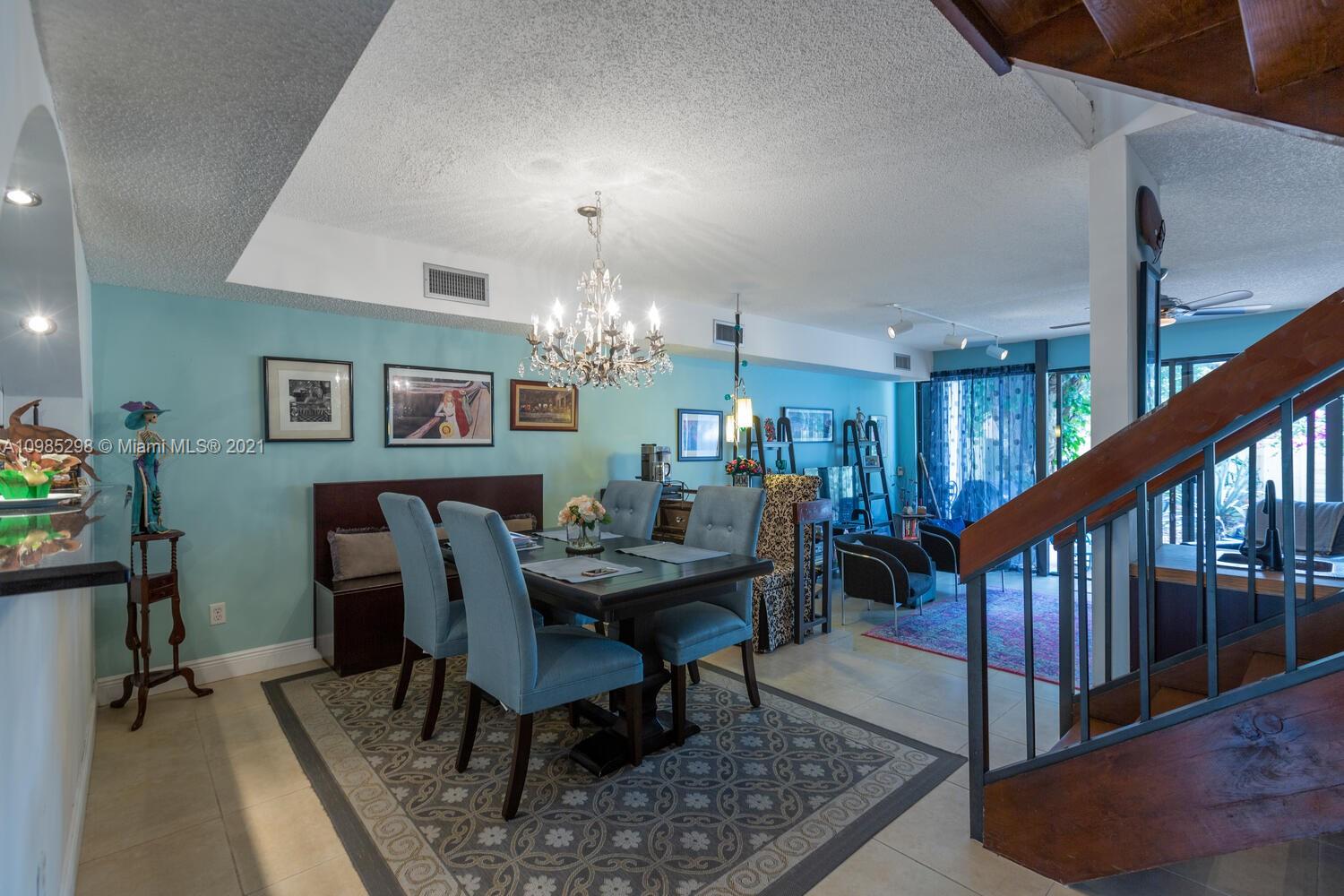 7028 Southwest 53rd Lane Miami, FL 33155 - Photo 3 of 27 a view of a dining room with furniture