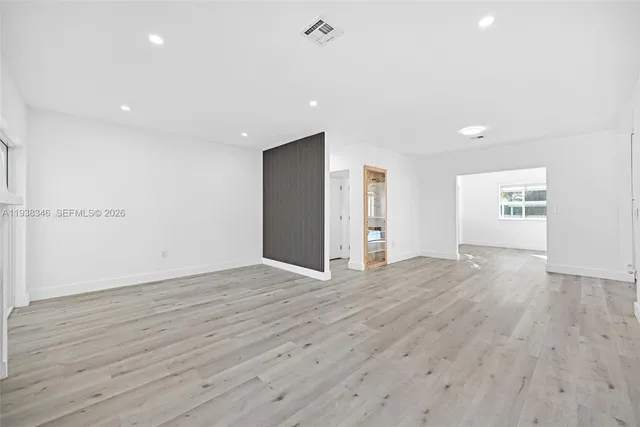 a view of kitchen with wooden floor