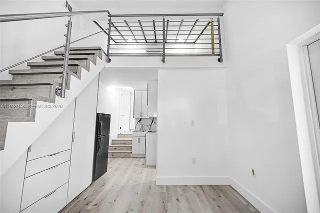 a view of a house with a back yard