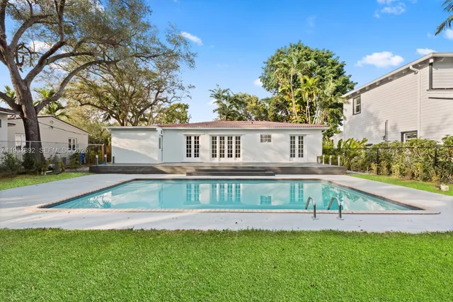 a view of a house with a swimming pool