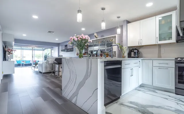 a kitchen with furniture and a kitchen