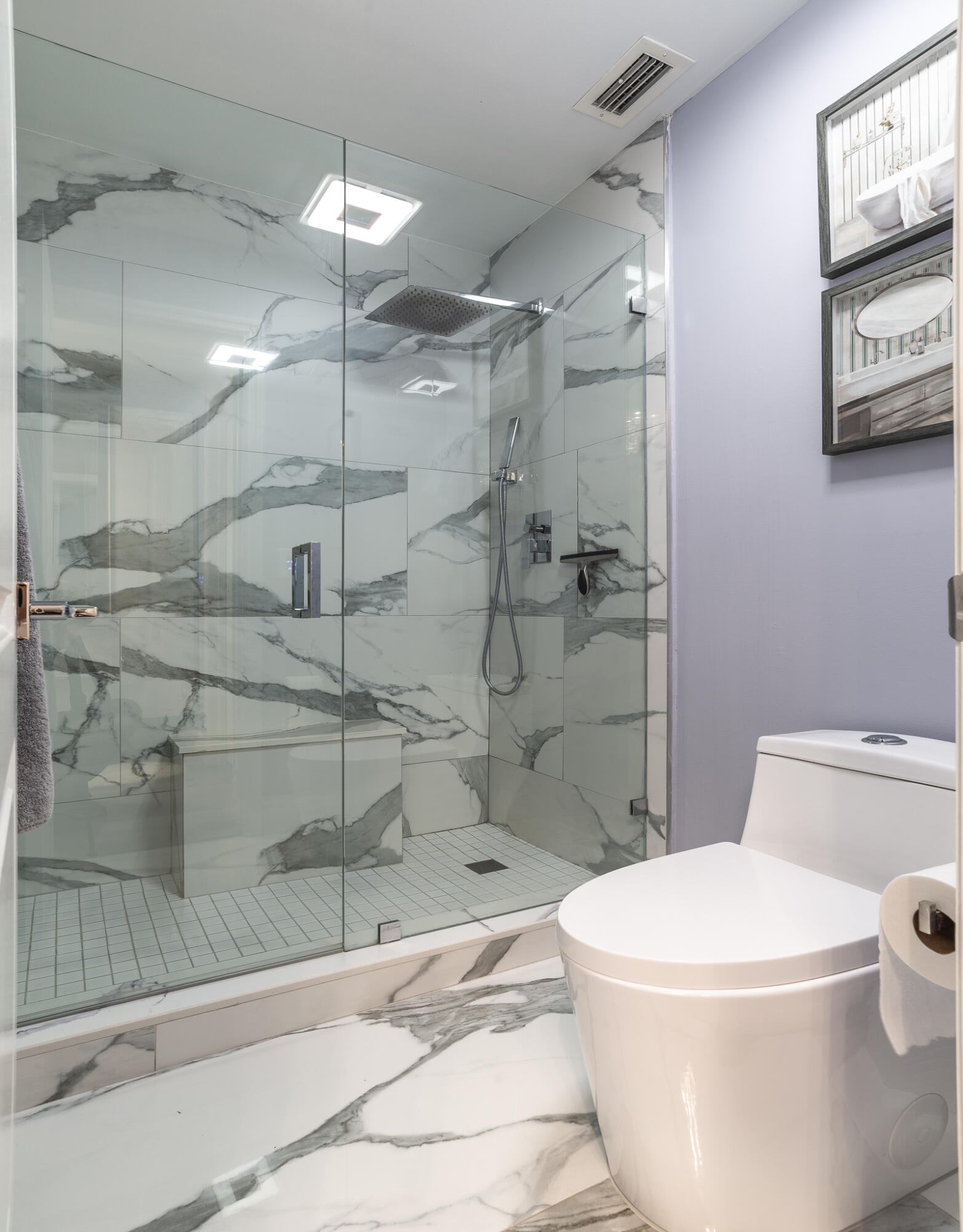 2915 Southwest 15th Street, Unit 203 Delray Beach, FL 33445 - Photo 27 of 48 a white toilet sitting next to a bath tub and shower