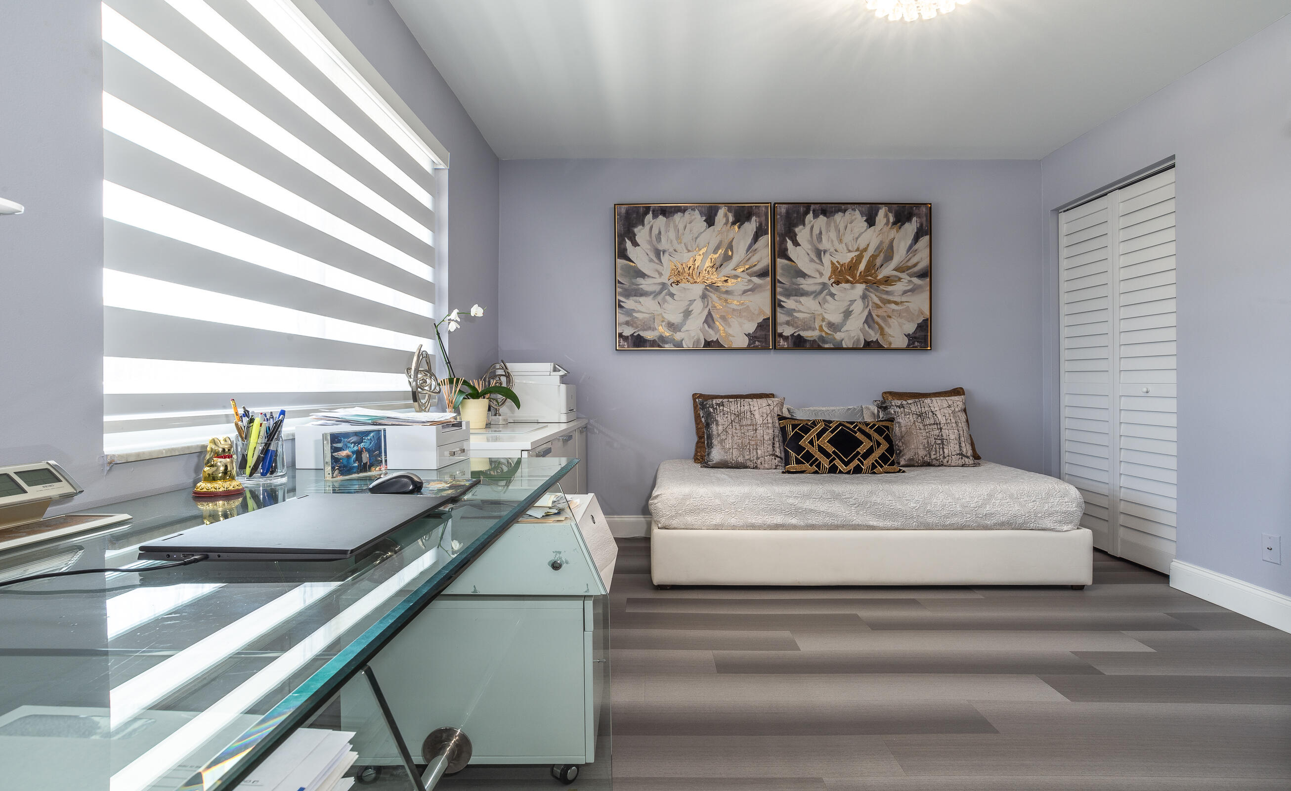 2915 Southwest 15th Street, Unit 203 Delray Beach, FL 33445 - Photo 28 of 48 a bedroom with a bed and a large window