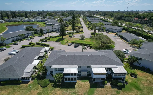 an aerial view of a house with a garden