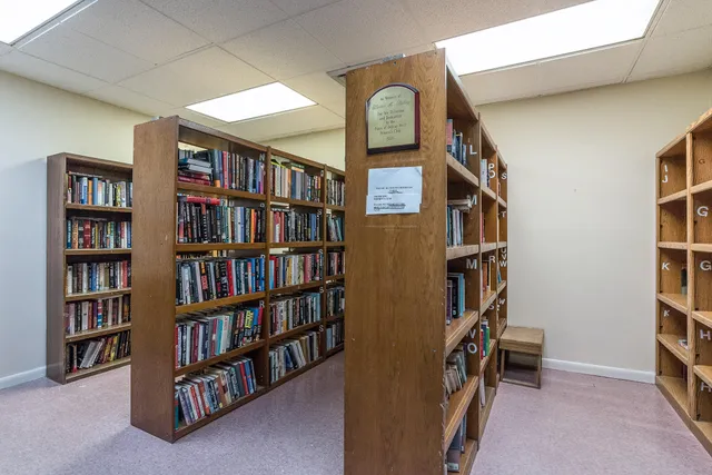 a view of room with furniture and closet