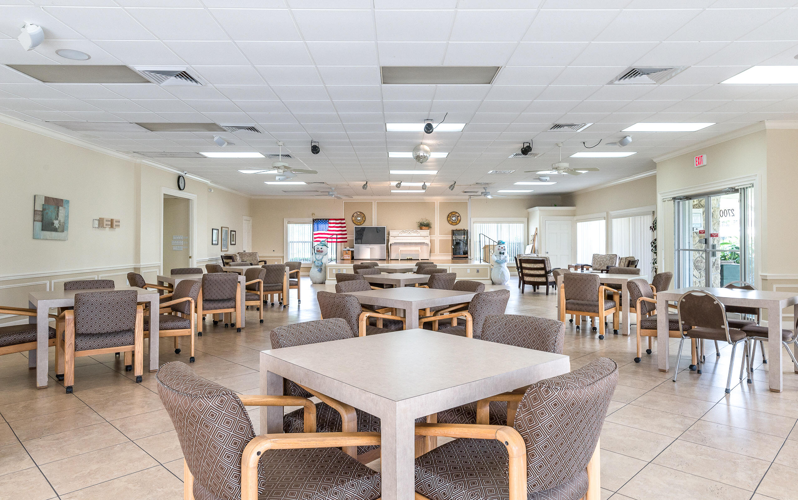 2915 Southwest 15th Street, Unit 203 Delray Beach, FL 33445 - Photo 46 of 48 a view of a dining area with furniture