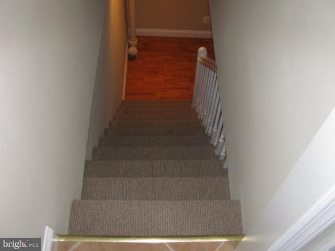 1011 Andover Road Baltimore, MD 21218 - Photo 18 of 29 a view of staircase with white walls