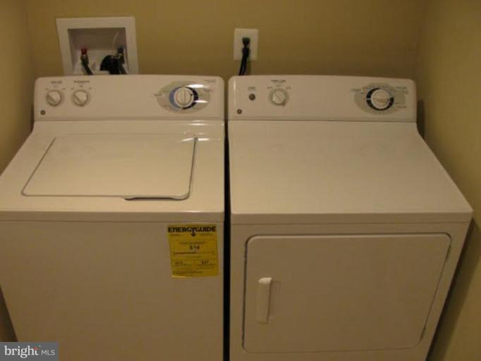1011 Andover Road Baltimore, MD 21218 - Photo 21 of 29 a close up of a washer and dryer