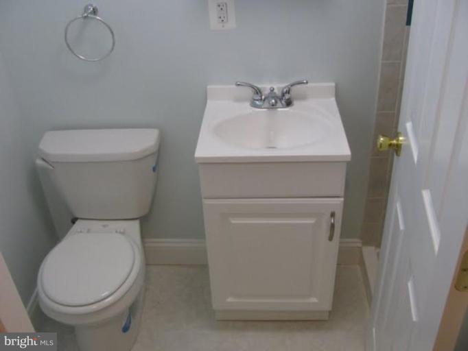 1011 Andover Road Baltimore, MD 21218 - Photo 23 of 29 a close view of a toilet in a bathroom