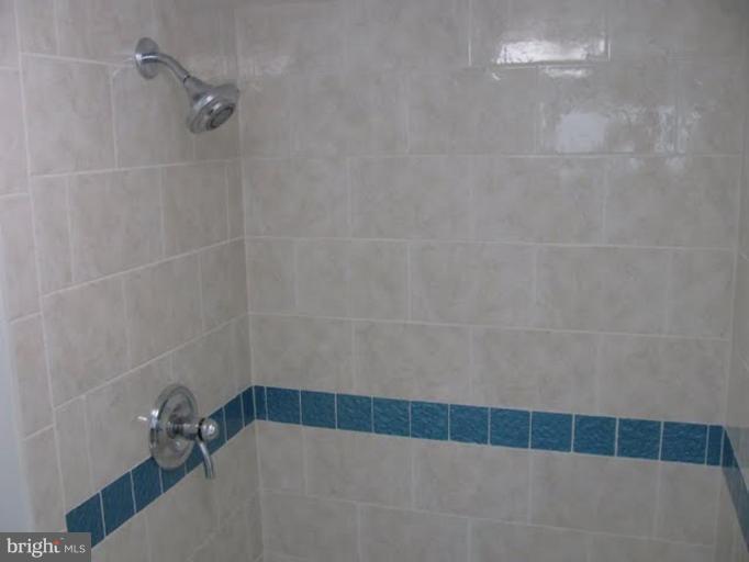 1011 Andover Road Baltimore, MD 21218 - Photo 24 of 29 a bathroom with a shower