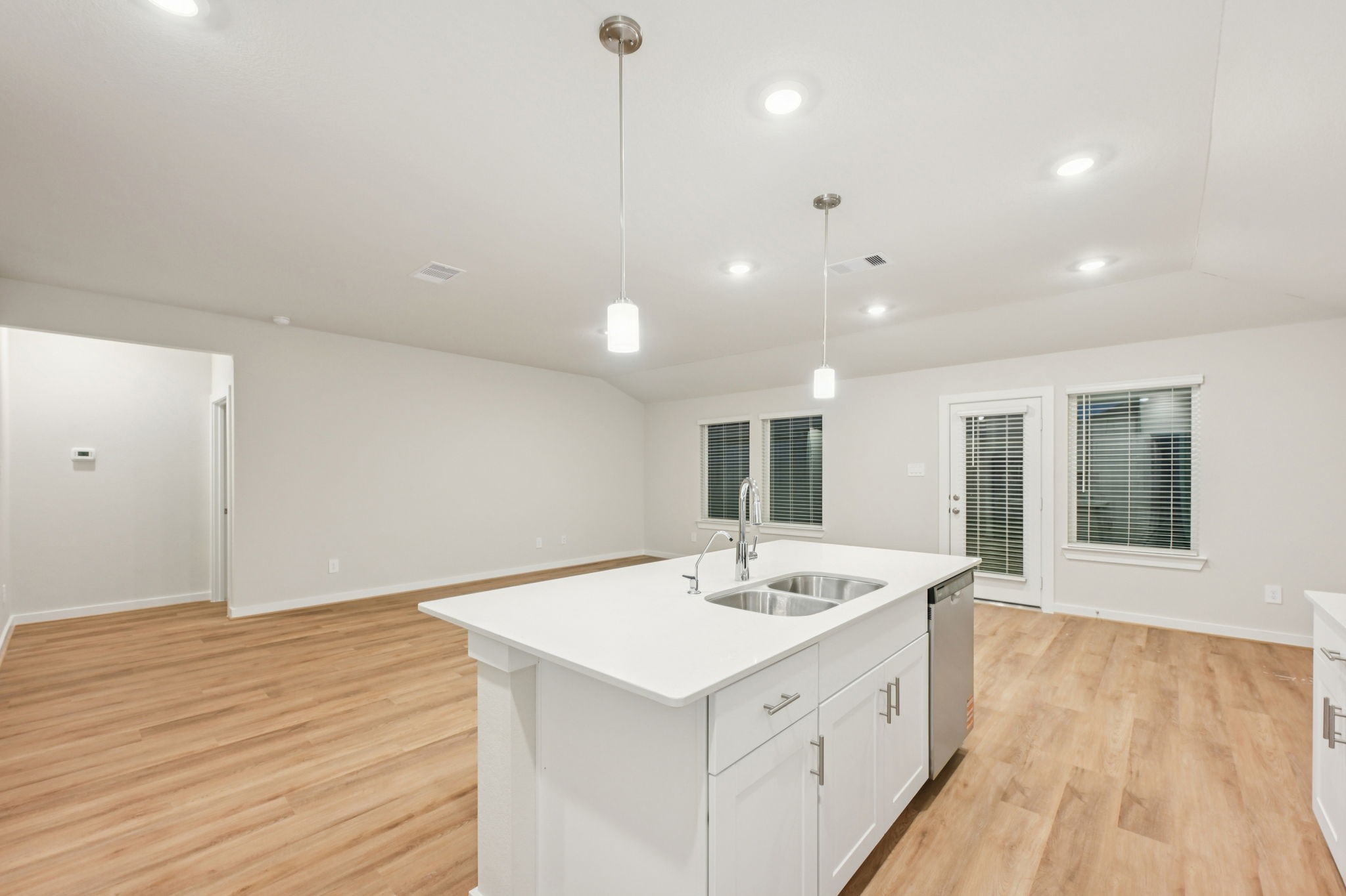 1637 Hopson Ranch Drive Conroe, TX 77301 - Photo 13 of 39 a view of center island in hallway