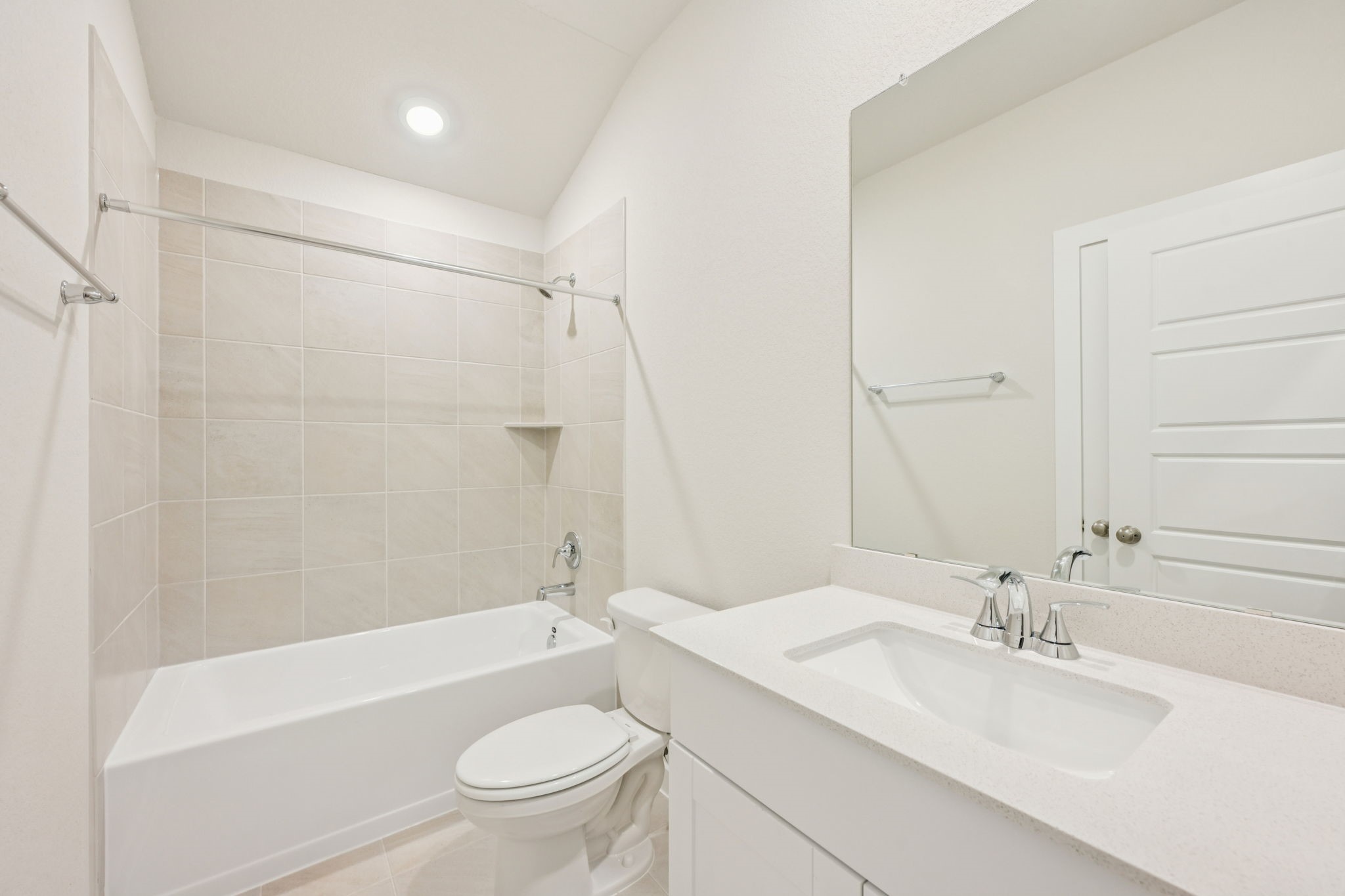 1637 Hopson Ranch Drive Conroe, TX 77301 - Photo 19 of 39 a bathroom with a sink a toilet and a bathtub
