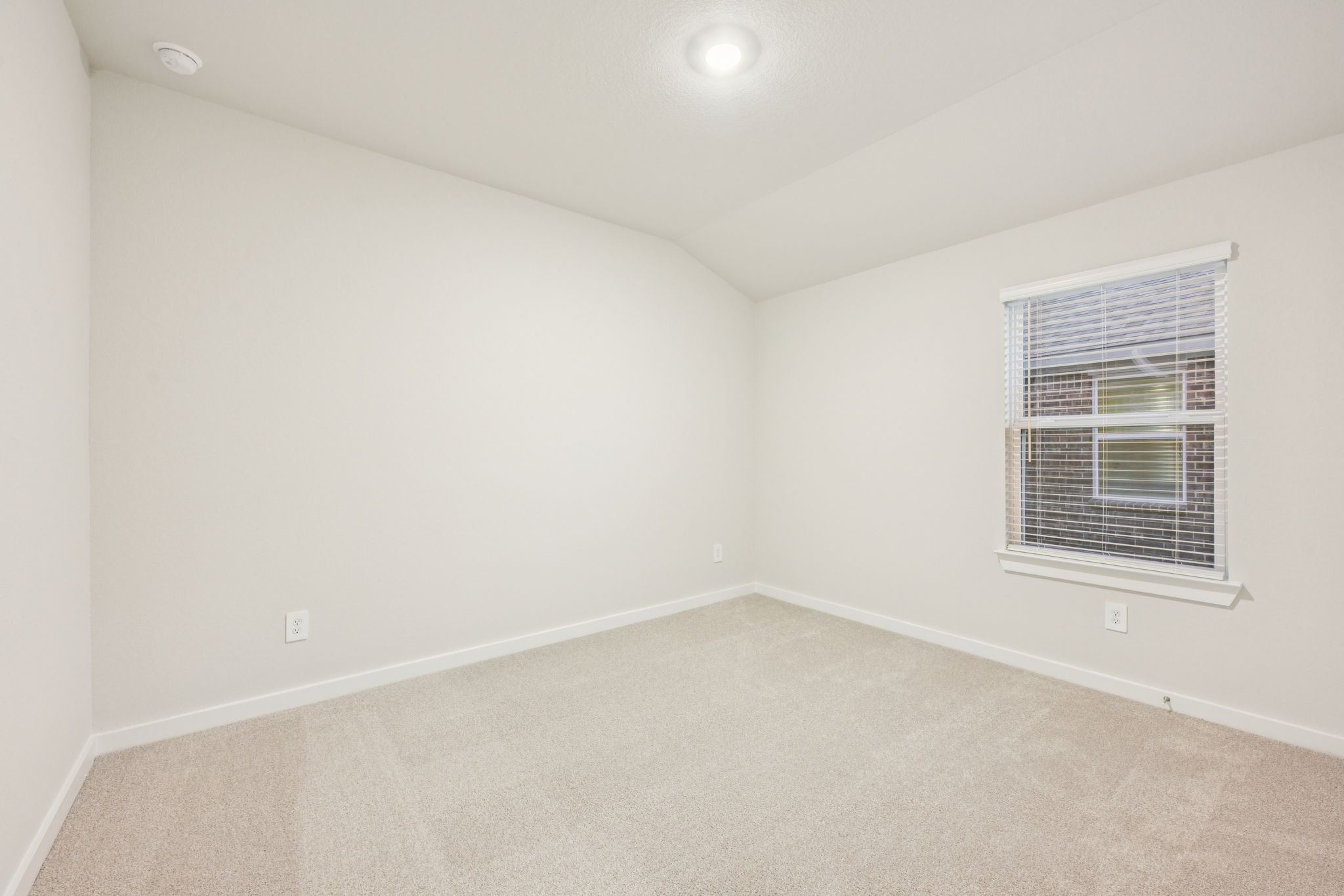 1637 Hopson Ranch Drive Conroe, TX 77301 - Photo 20 of 39 an empty room with a window