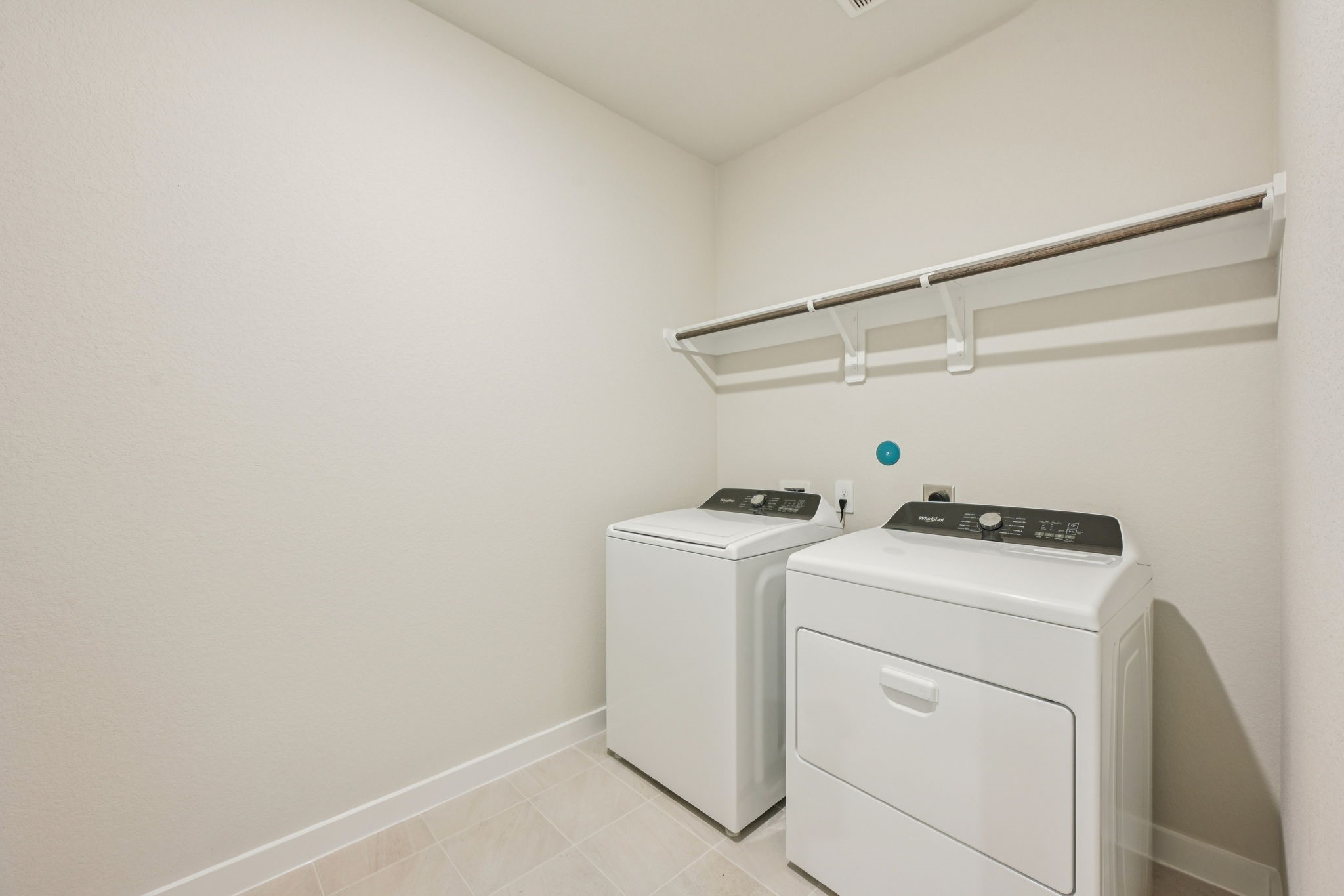 1637 Hopson Ranch Drive Conroe, TX 77301 - Photo 23 of 39 a utility room with dryer and washer