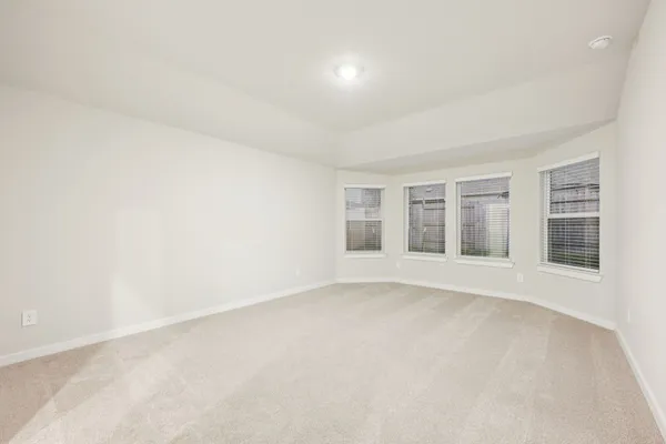 a bedroom with double bed furniture and a window