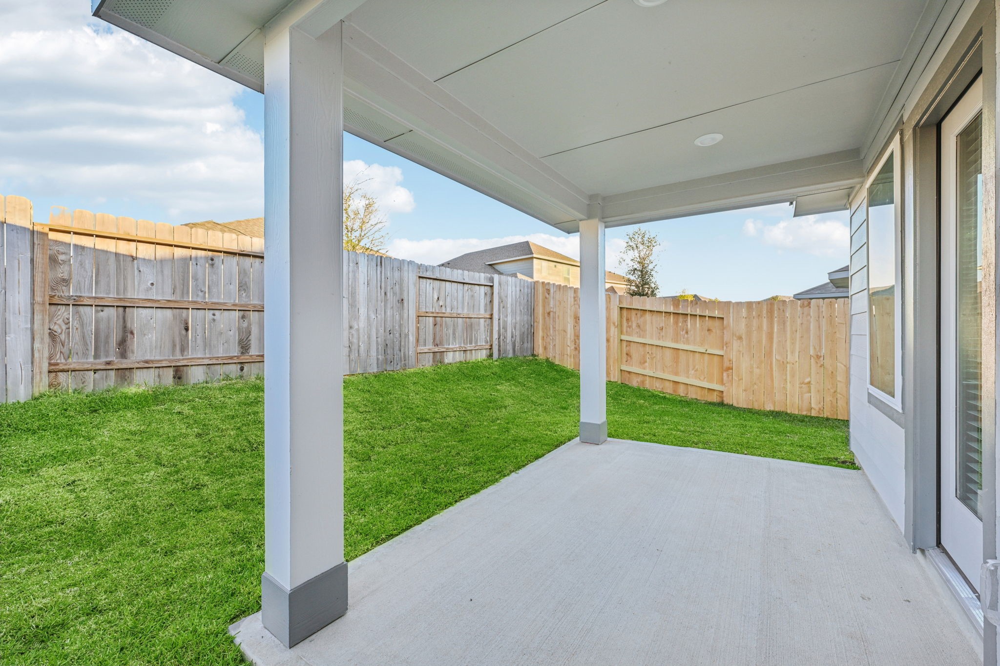 1637 Hopson Ranch Drive Conroe, TX 77301 - Photo 31 of 39 a view of a porch with a big yard and large tree