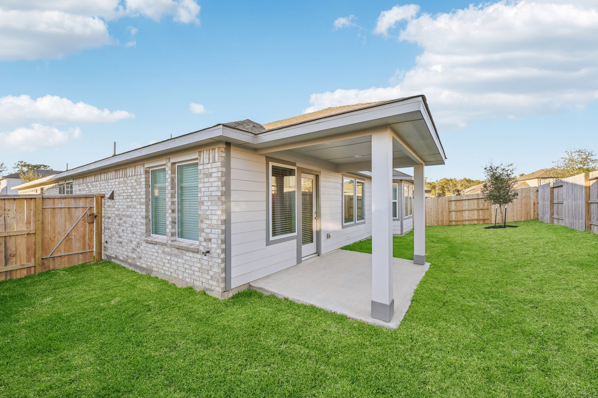 1637 Hopson Ranch Drive Conroe, TX 77301 - Photo 34 of 39 a view of a house with backyard