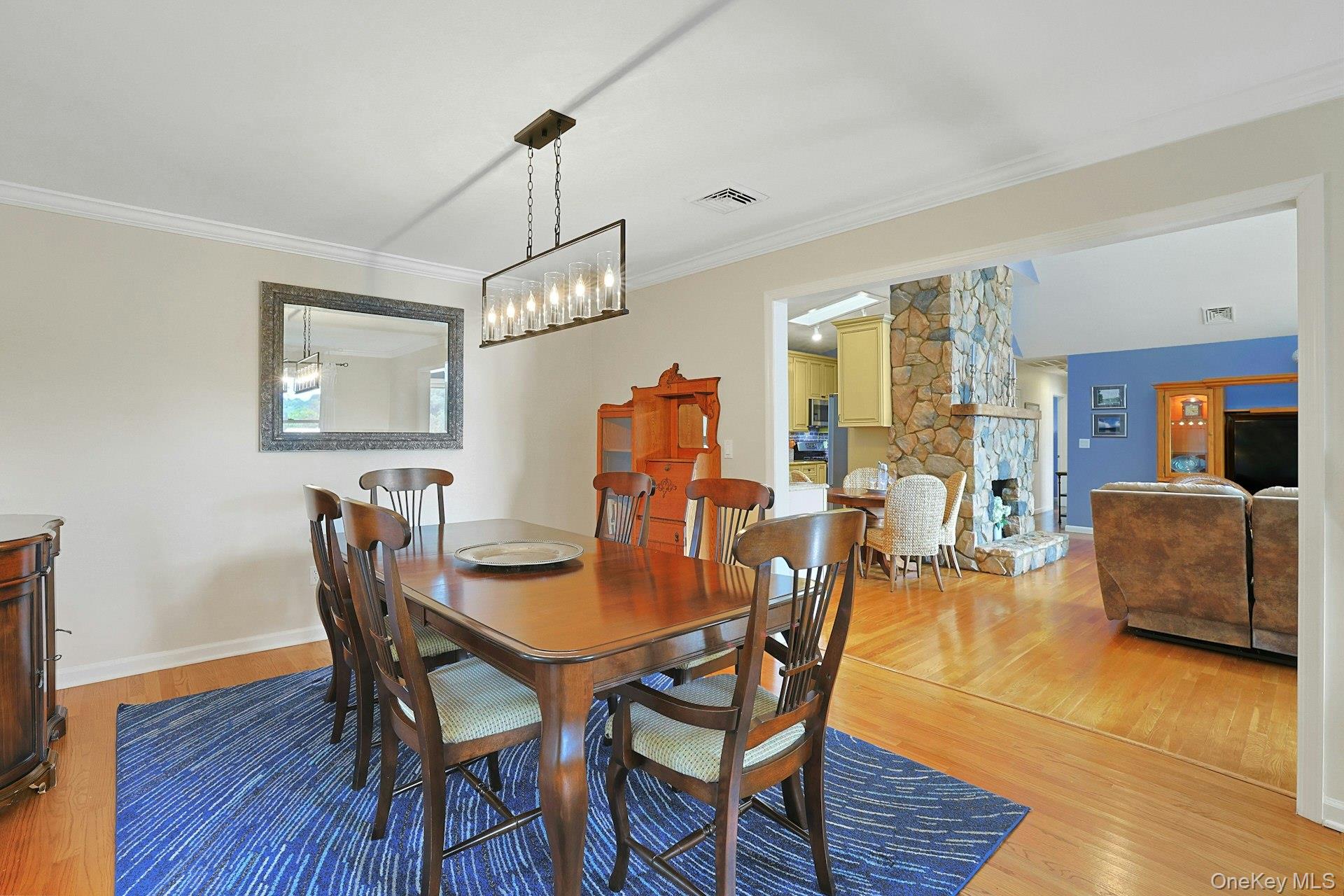 11 Lakeside Road Mahopac, NY 10541 - Photo 19 of 48 The dining room flows seamlessly into both the living room and kitchen, creating an open, inviting space