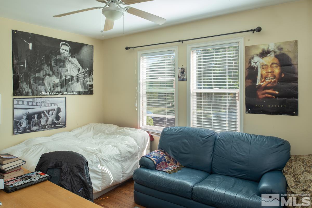 105 Bisby Street Reno, NV 89512 - Photo 11 of 17 a bedroom with a bed couch and window