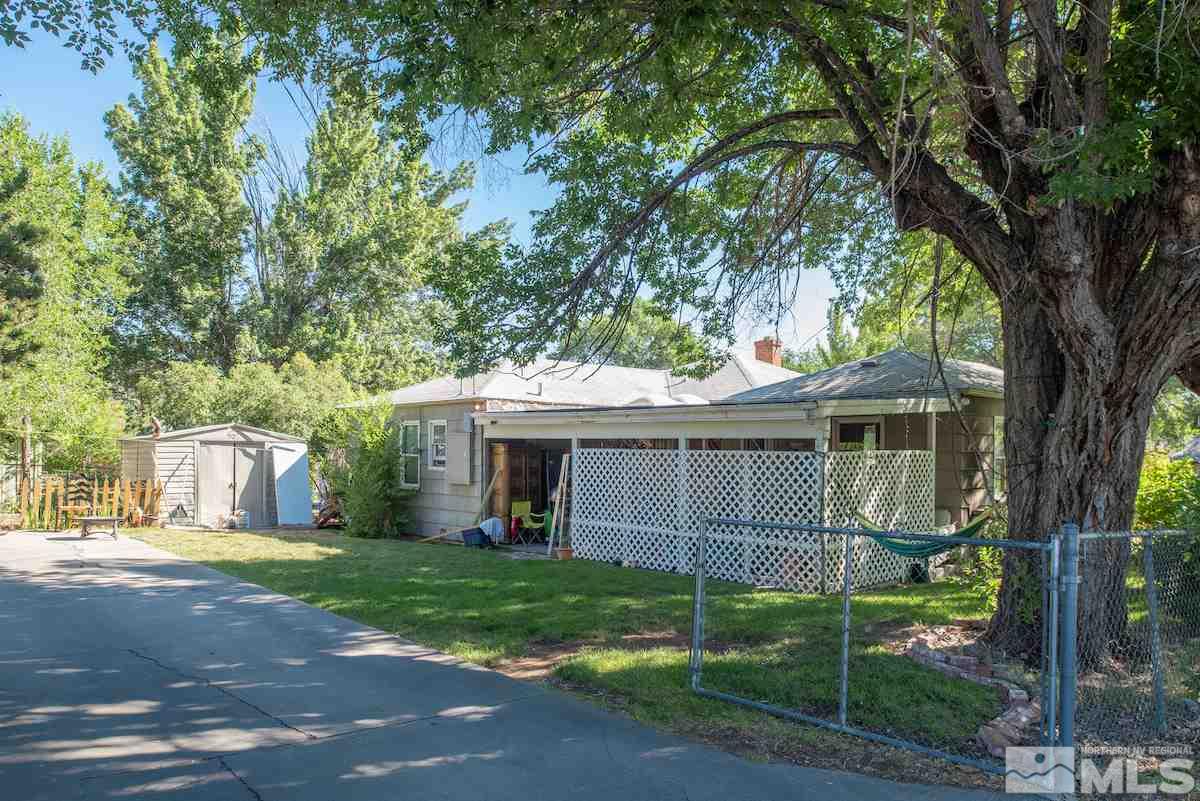 105 Bisby Street Reno, NV 89512 - Photo 5 of 17 a front view of house with yard and green space