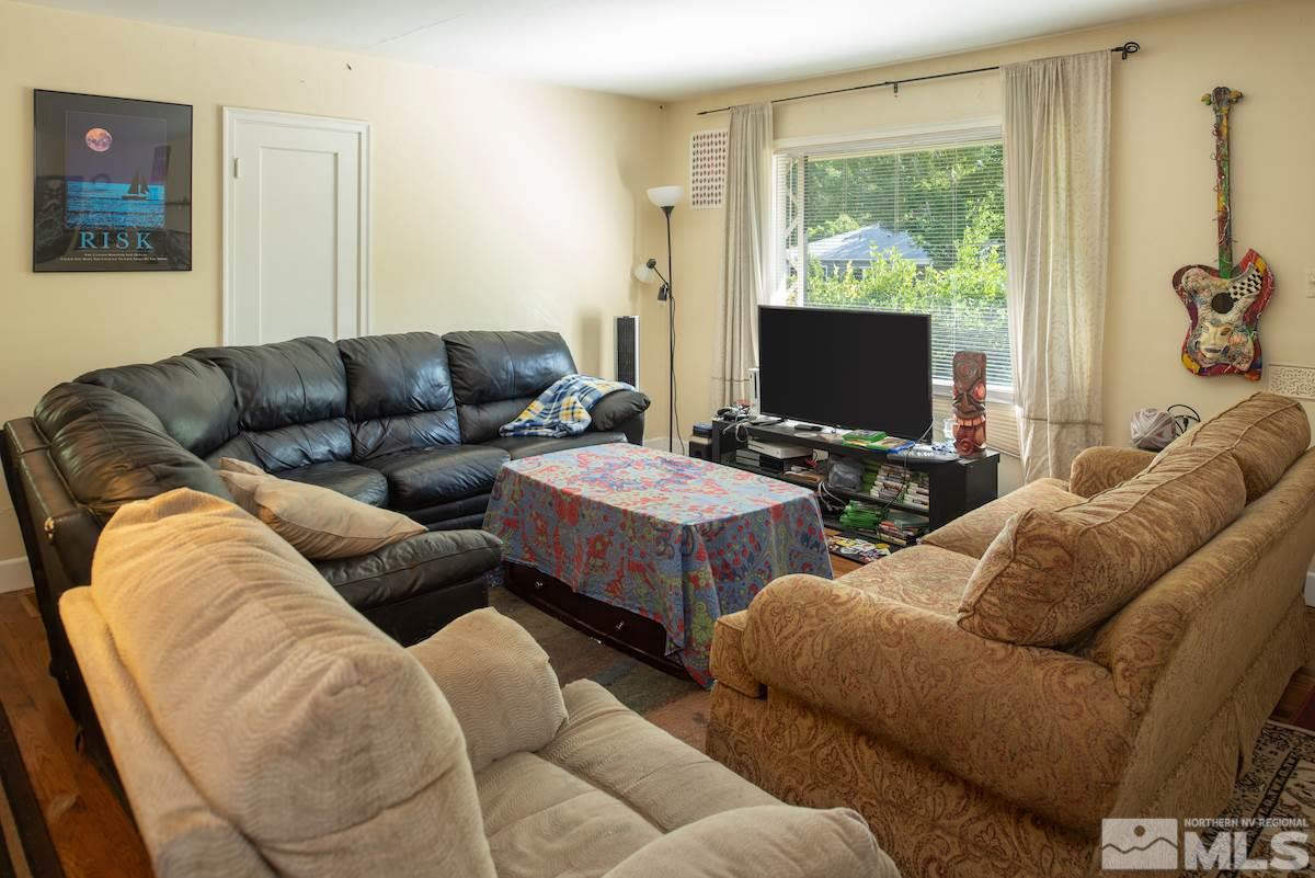 105 Bisby Street Reno, NV 89512 - Photo 6 of 17 a living room with furniture and a flat screen tv