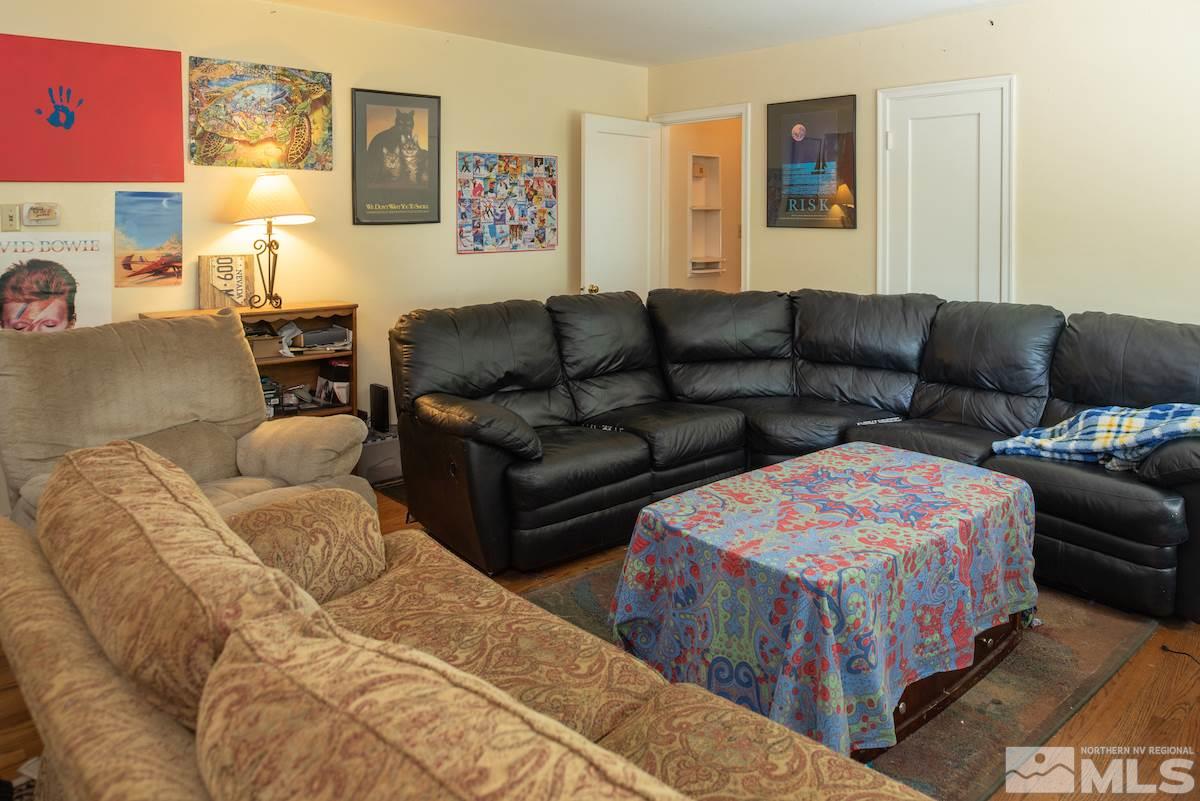 105 Bisby Street Reno, NV 89512 - Photo 7 of 17 a en suite bedroom with a bed and couch