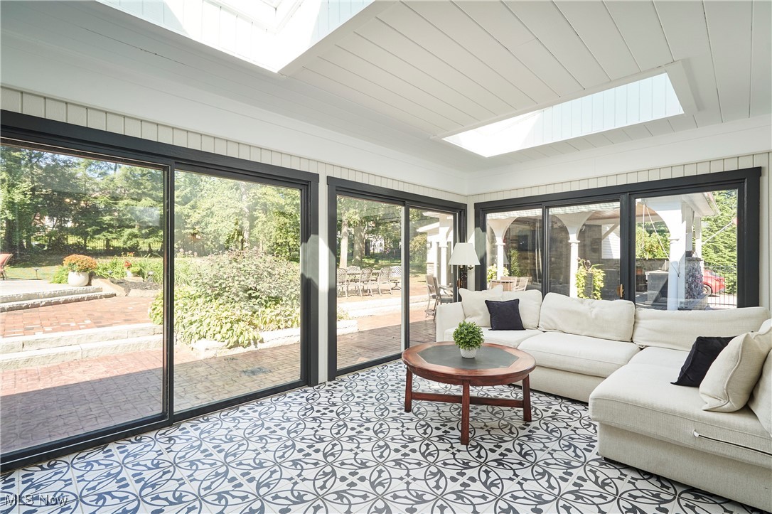 2285 Lancaster Road Akron, OH 44313 - Photo 16 of 48 Sunroom featuring a skylight and wooden ceiling