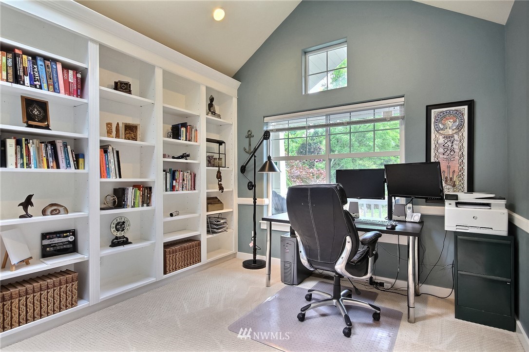 4706 224th Street Southeast Bothell, WA 98021 - Photo 26 of 38 a view of a workspace with furniture and a window