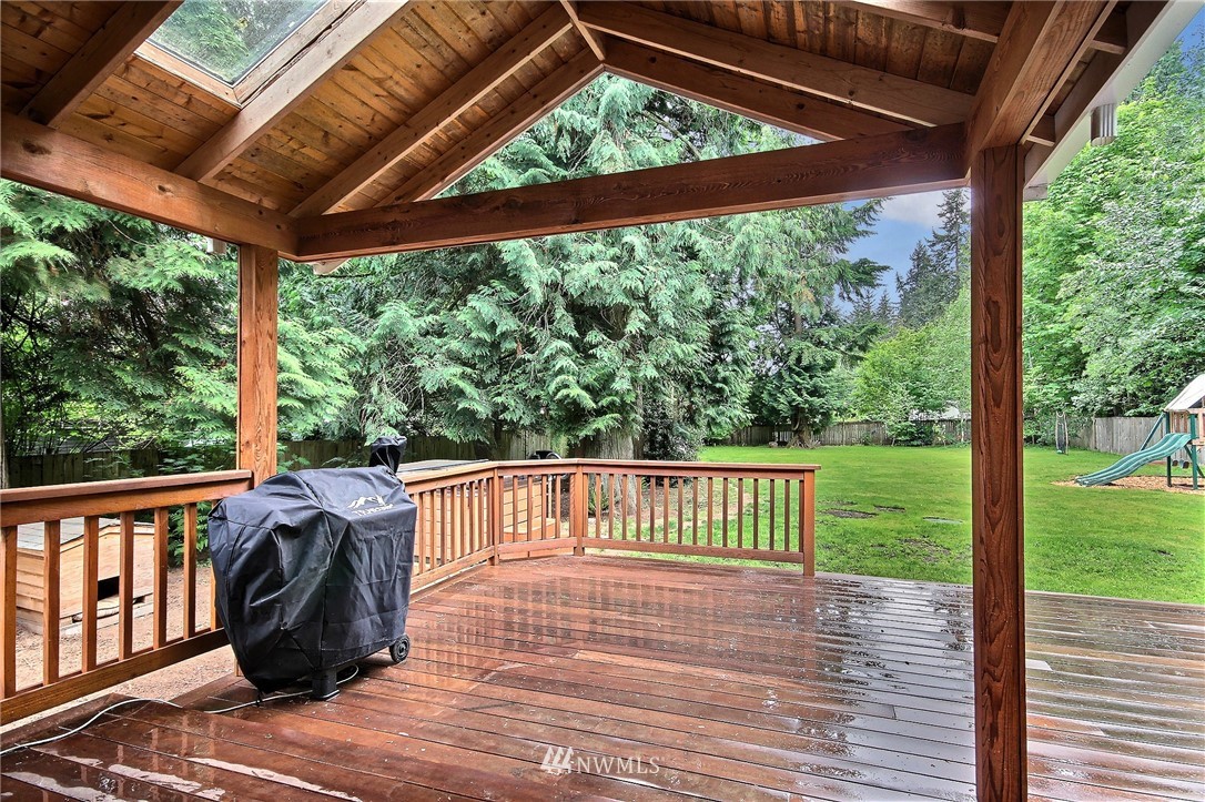 4706 224th Street Southeast Bothell, WA 98021 - Photo 31 of 38 a view of a two chairs in the deck