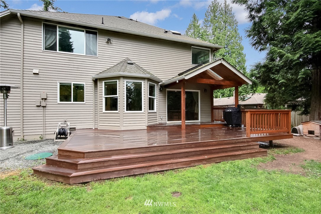 4706 224th Street Southeast Bothell, WA 98021 - Photo 32 of 38 a front view of a house with a yard