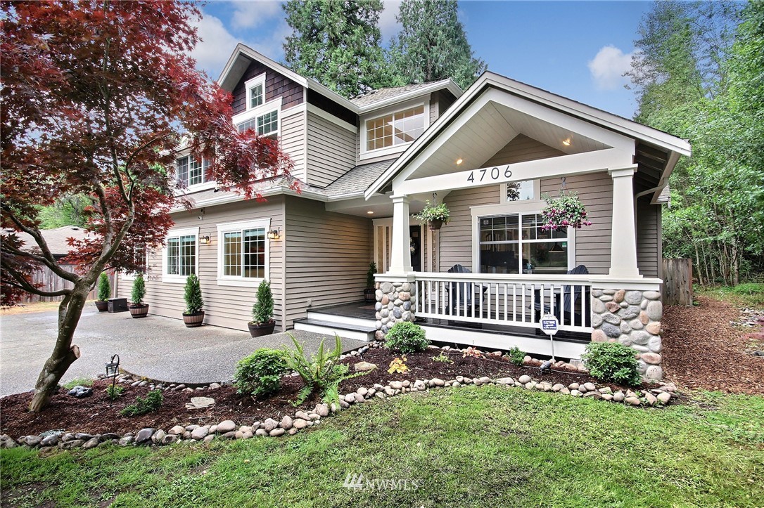 4706 224th Street Southeast Bothell, WA 98021 - Photo 36 of 38 a front view of a house with a yard