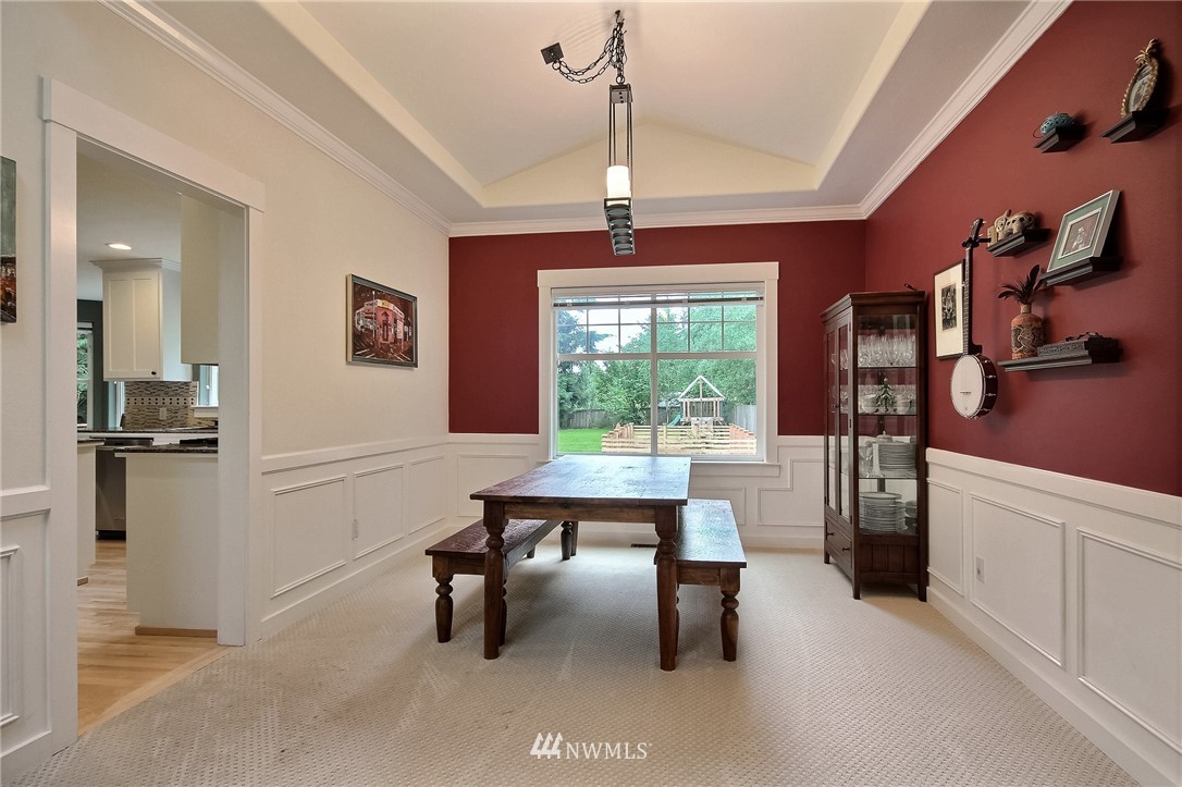 4706 224th Street Southeast Bothell, WA 98021 - Photo 6 of 38 a view of a workspace with furniture and a window