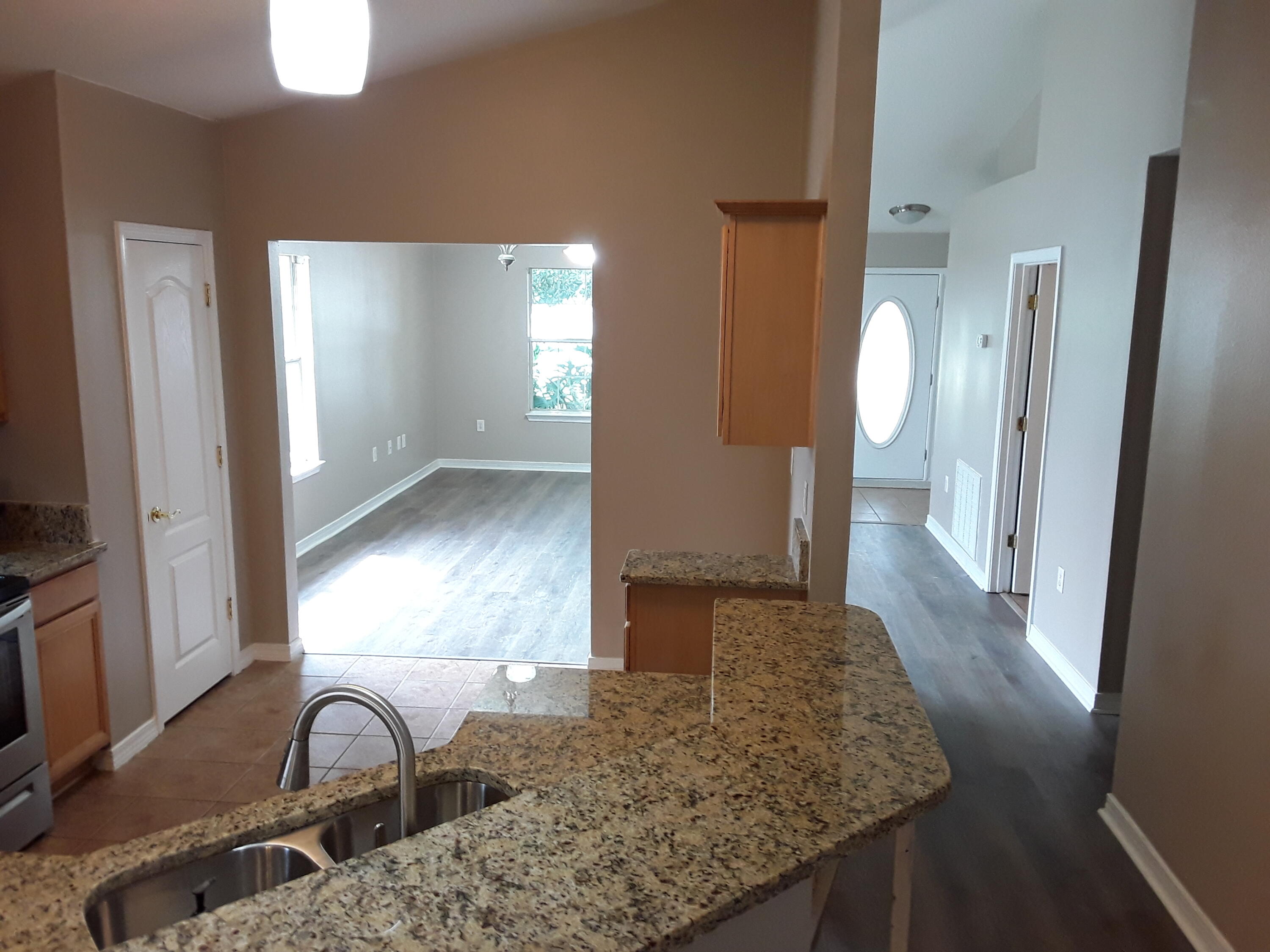 57 Red Bay Court Santa Rosa Beach, FL 32459 - Photo 10 of 55 Kitchen towards front living area and ha